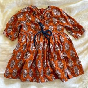 Pink chicken 6/12 month floral dress. Used good condition, some light fading